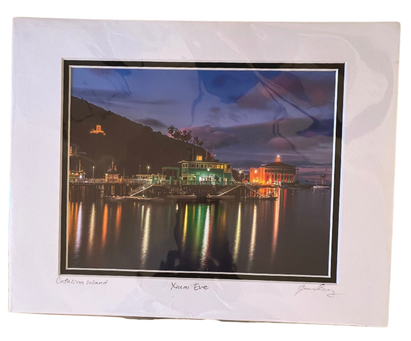 Finished Catalina Island nighttime photograph with a white outer mat and black inner mat, shown in its protective sleeve; frame not included